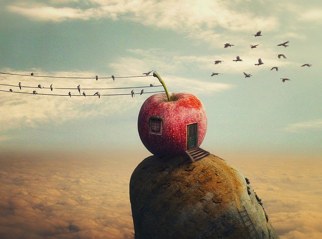 Obraz przedstawiający dom w jabłku